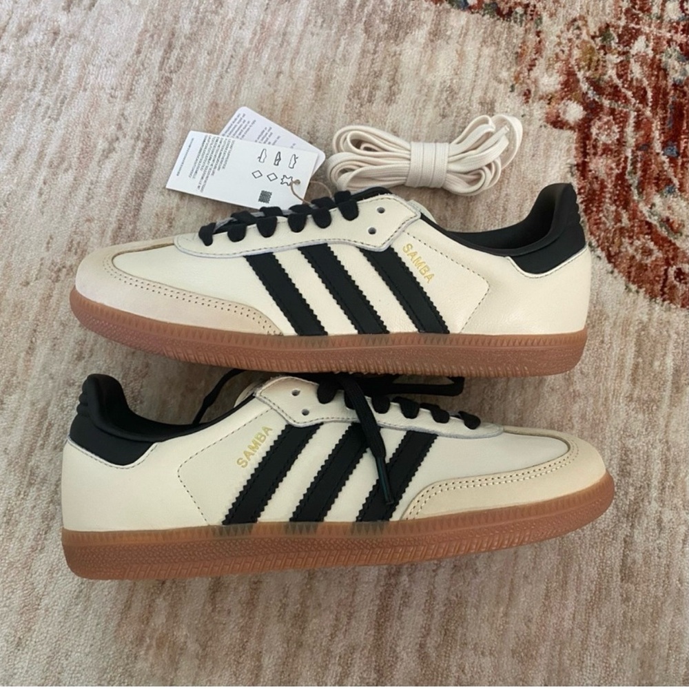 Adidas Women’s Samba in black and cream with gum sole.